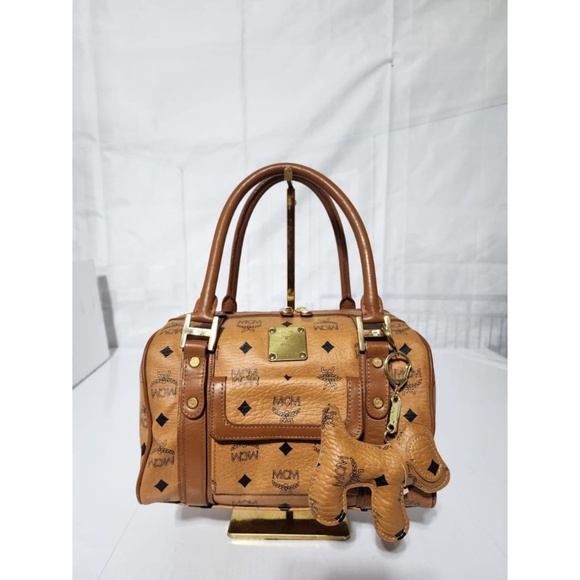 Authentic MCM Visetos Front Pocket Boston Bag with Dog Bone Charm Cognac - Picture 1 of 16